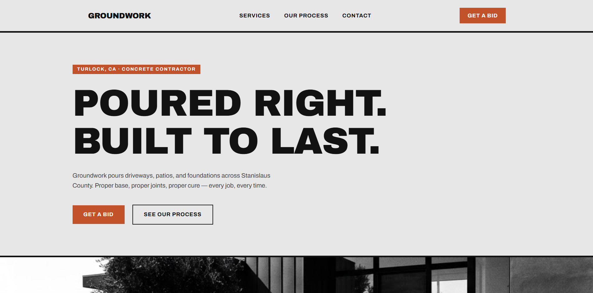 Groundwork Concrete Design website homepage with the headline Poured Right. Built to Last. over a bold gray and rust-orange layout