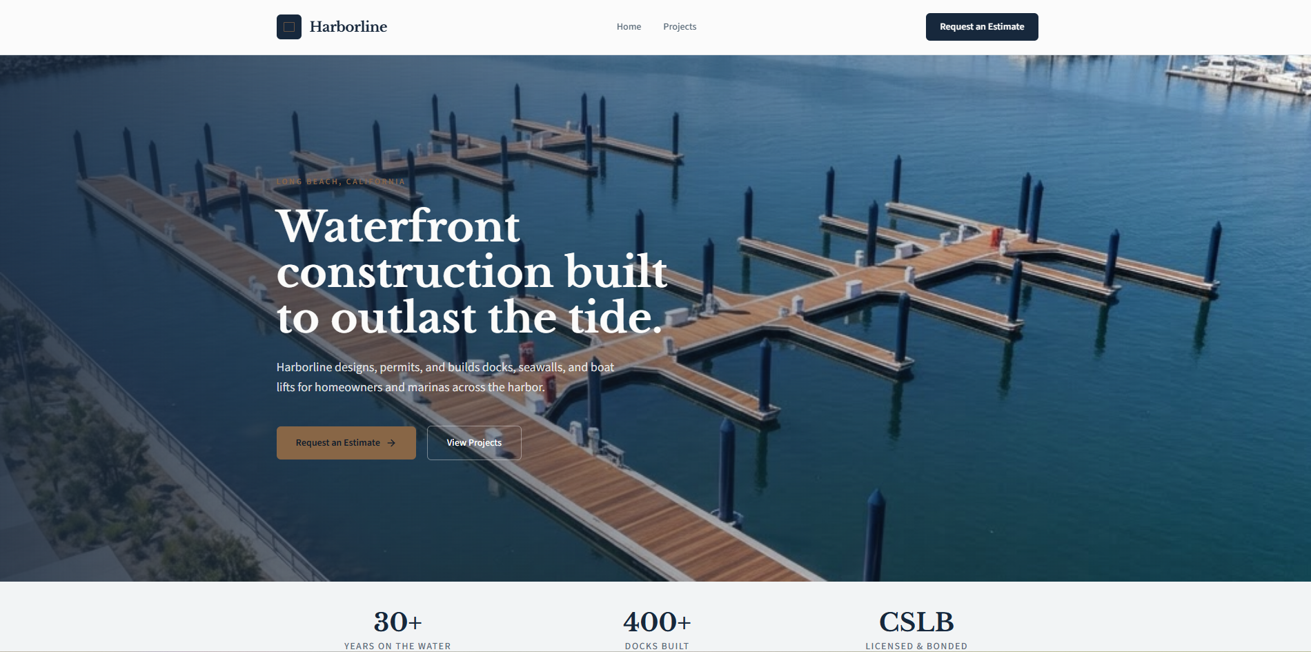 Harborline website homepage with an aerial photo of wooden docks in a marina and the headline waterfront construction built to outlast the tide